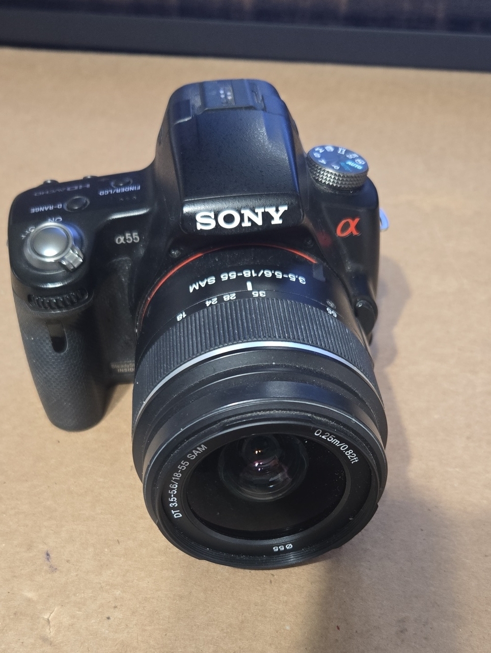 Sony DSLR Camera in Black with Black Zoom Lens